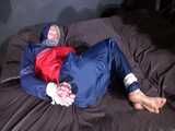 Watch Sonja beeing bound and gagged in shiny nylon Rainwear