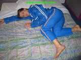 156 pictures of Katharina in shiny nylon rainwear ffrom the years 2005 to 2008!