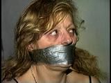 43 YEAR OLD WAITRESS IS TAPE HOG-TIED, BAREFOOT, TOE-TIED & WRAP TAPE GAGGED (D65-8)