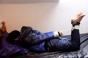 Shelly tied and gagged in shiny nylon pants and a shiny nylon dowjacket