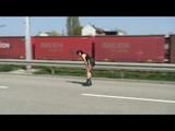 Stella during inline skating wearing shiny nylon shorts and rain jacket (Video)