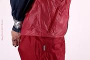 Shelly bound and gagged in shiny nylon rainwear