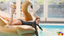 666 Foxy Sanie has fun in the swimming pool.