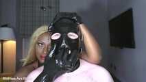 Huge rubber hands in the gimp’s mouth