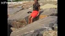 016169 Eve Takes A Discrete Pee On The Rocks