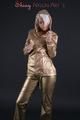 Blonde archive girl posing in a studio wearing a sexy golden rainwear combination (Pics)