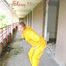 Leonie wearing a super sexy yellow rainwear combination posing outdoor (Pics)
