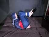 Watch Sonja beeing bound and gagged in shiny nylon Rainwear