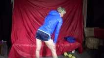 Watching sexy Sonja wearing a supersexy oldschool blue shiny nylon shorts and a lightblue rain jacket during her workout with barbells (Video)
