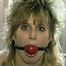 BIG TITS KIM IS BALL-GAGGED, TIT TIED, SEMI NUDE & DROOLING ON THE BED (D44-2)