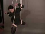 Get 4 classic videos with Lupi wearing shiny nylon rainwear beeing tied and gagged