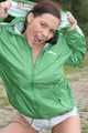Watching ***OUR SEXY ARCHIVE MODEL JENNY*** wearing a sexy white shiny nylon shorts and a green shiny nylon rain jacket posing for you (Pics)