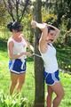 Jill tied and gagged by her friend in shiny nylon shorts
