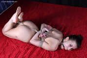 Danielle, hogtied, gagged and thumbtied
