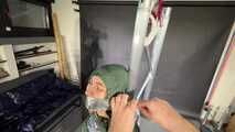 Rey Sanson broke into the wrong House getting bound and gagged in her Rainwear by to other Burglers