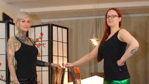 Lady Nadja and Miss Francine in layers of raingear