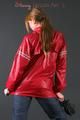 Anastasia posing in a foto studio wearing supersexy rainwear (Pics)