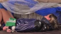 Alina tied and gagged in a princess bed standing in an old cellar wearing hot shiny nylon shorts and rainjacket (Video)