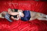***COURTNEY***NEW MODELL***being tied and gagged with ropes and a clothgag on a sofa wearing an oldschool blue shorts and a black top trying to get out (Pics)
