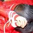 Lucy tied, gagged and hooded on a bed wearing a sexy black shiny nylon pants and a red down jacket (Pics)