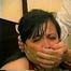 29 Yr OLD FEISTY BBW SHARON GETS MOUTH STUFFED, WRAP TAPE GAGGED & TIED UP ON THE BED (D55-9)