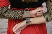 Damsel Sophia cuffed with special rigid cuffs