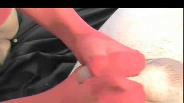 Footjob in Red Stockings