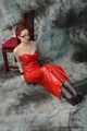 Bound in red PVC dress