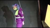 MARA tied and gagged overhead with ropes and a cloth gag wearing a super sexy super shiny purple rainsuit and blue rubber boots (Video)