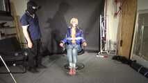 Alice bound and gagged in a shiny nylon Downjacket