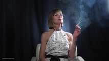 34 years old lady is smoking cork 100mm cigarette