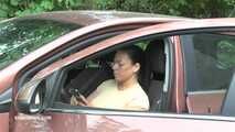 Jenna tramples on the pedal and slave sucks on the gas