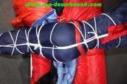 Sexy Sonja wearing a sexy oldschool shiny nylon downbib and donjacket being tied and gagged with ropes overhead (Pics)