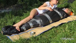 Dana & Mishel - Hitchhiker Mishel wrapped, packed and dominated by Dana