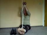 Tied bare feet