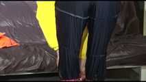 Watching Mara putting on a down jacket, rubber boots and a lifevest (Video)