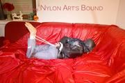 Sonja tied and gagged with ropes and a ball gag wearing a sexy grey shiny nylon rain pants and a black down jacket (Pics)