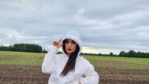 Miss Amira in KWAY rain suit