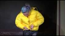 Watching Mara putting on a down jacket, rubber boots and a lifevest (Video)