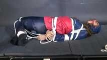 Marie bound and gagged in shiny nylon Rainwear