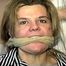38 Yr OLD SOCIAL WORKER GETS HANDGAGGED, SOCK STUFFED IN MOUTH, MOUTH STUFFED, CLEAVE GAGGED AND TIED TO A CHAIR (D69-3)