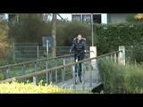 Enni riding the bicycle wearing a sexy shiny nylon shorts beneath the jeans and a downjacket on naked skin (Video)