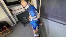 Myxxxy bound and gagged, wearing shiny nylon shorts and a windbreaker