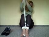 Tied bare feet