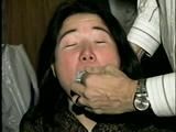 25 YEAR OLD ASIAN MAI-LING IS MOUTH STUFFED, CLEAVE GAGGED, HANDGAGGED, OTM GAGGED, TAPE GAGGED & TIGHTLY TIED TO A CHAIR  (D47-15)