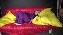 Watching sexy Sonja weraing a sexy down skirt and a down jacket putting on a sexy purple rainsuit (Video)