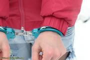 Cuffed in the snow