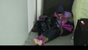 03:30 Min. video with Jill tied and gagged in shiny nylon rainwear