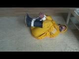 03:20 Min. video with Katharina bound in a yellow rainsuit