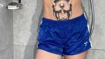 Myxxxy wetting her shiny nylon Shorts